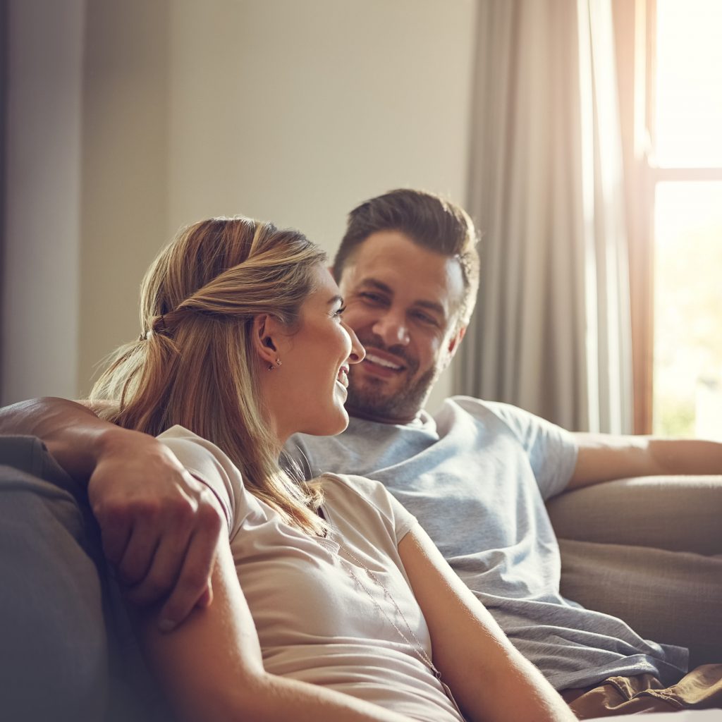 loving couple relaxing together on couch indoors 2026 01 09 11 14 32 utc